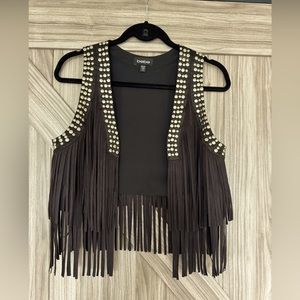 Bebe black, studded, fringed vest.  Hello, Nashville bachelorette party!